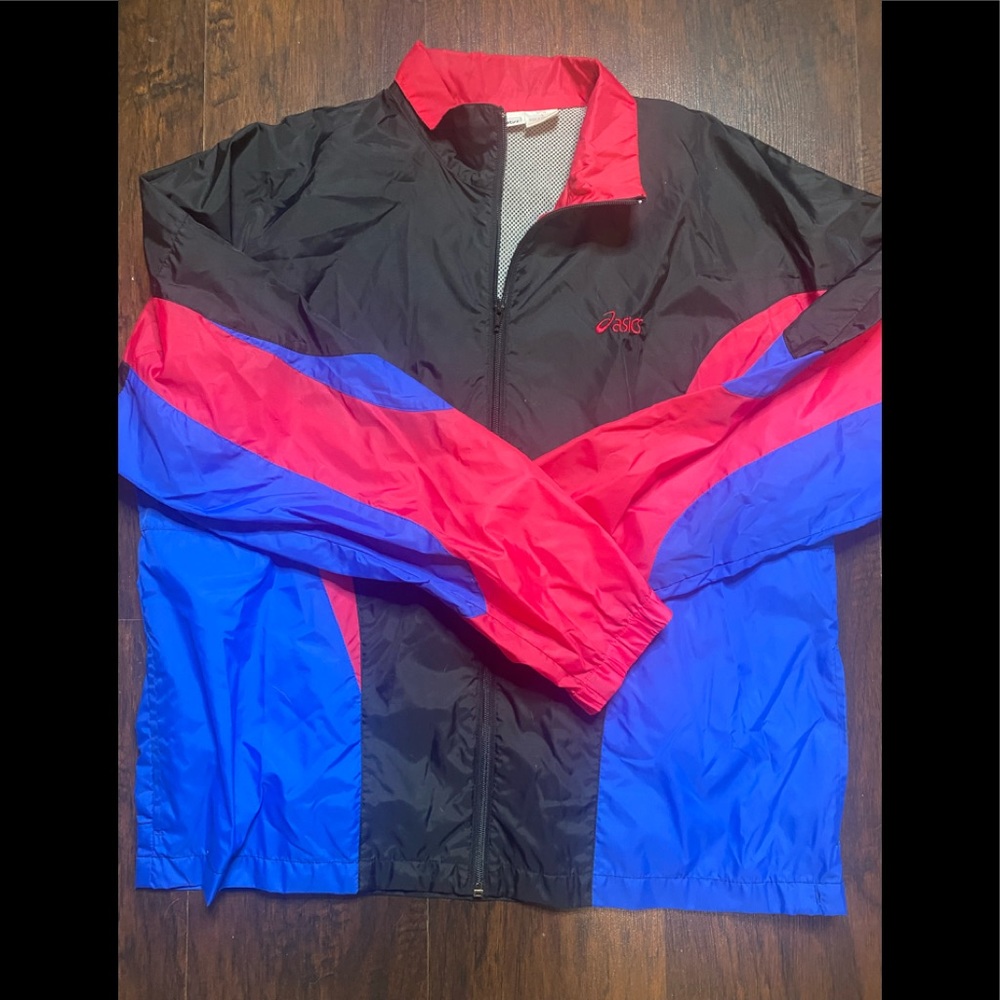 Windbreaker blue and pink, perfect for the spring. Oversize/size L.